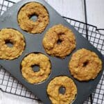 baked low calorie donuts in a pan on a rack