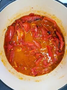 roasted tomatoes and peppers in a saucepan