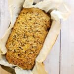 a loaf of the best high protein bread in a loaf pan