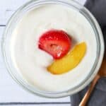 a dish filled with plant based yogurt and fruit
