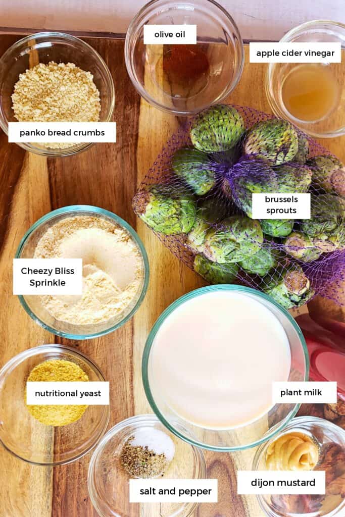low carb brussel sprout casserole ingredients on a cutting board