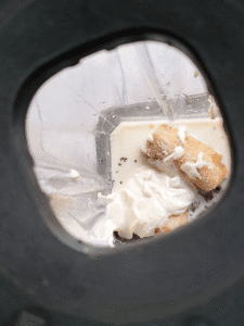 vanilla protein shake ingredients in a blender