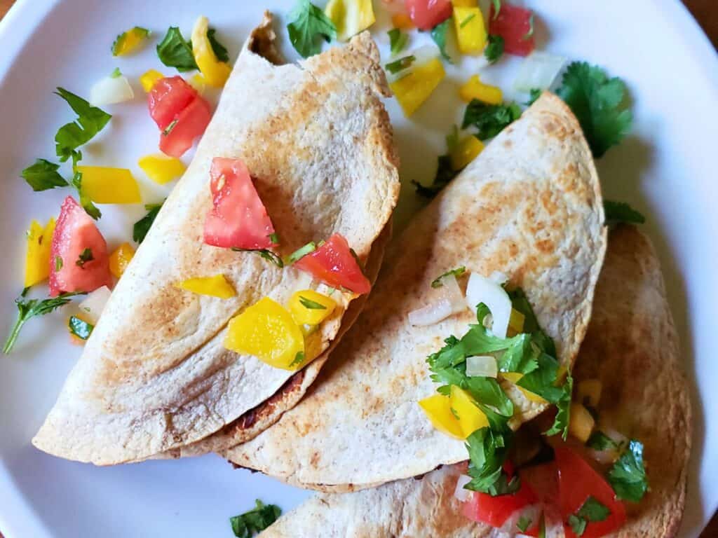 vegan tacos on a plate with pico de gallo
